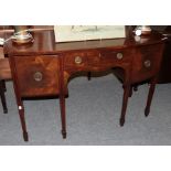 A George III mahogany bow-fronted sideboard