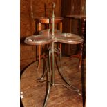 An Art Nouveau mahogany cakestand, with pierced gallery
