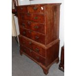 A George II walnut seven-drawer chest on chest