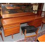 A teak dressing table, possibly Mcintosh; and an upholstered dressing stool