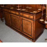 A Victorian brown oak and ebonised sideboard, 178cm by 65cm by 100cm high