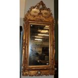 A 19th century gilt and gesso pier glass, 160cm by 73cm