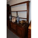 An oak Cumberland dresser with plate rack
