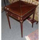 A late Victorian mahogany envelope games table