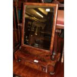 A George IV mahogany toilet mirror, the base with three small drawers