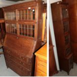 An early 20th century Globe Wernicke style narrow cabinet and matching bureau with glazed upper