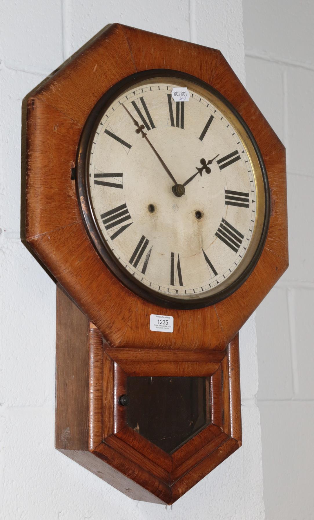 A drop dial striking wall clock