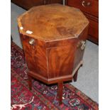 A George III mahogany octagonal cellaret on stand