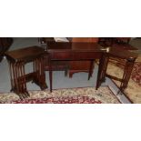 Three Edwardian mahogany and satinwood banded nesting tables; a set of four mahogany nesting tables;