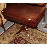 A Regency mahogany and ebony-strung fold-over tea table