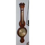 A 19th century mahogany and shell-patrae wheel barometer with silvered dial, signed E.Cattania,