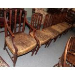 A set of six late 19th century style mahogany dining chairs, including two carvers, one chair with