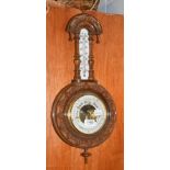 A walnut aneroid wheel barometer, circa 1900