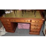 A late Victorian mahogany double-pedestal desk, 152cm by 78cm by 77cm