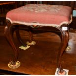 A Victorian walnut stool