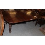 A Victorian mahogany extending dining table with two extra leaves and winder, 209cm (extended) by