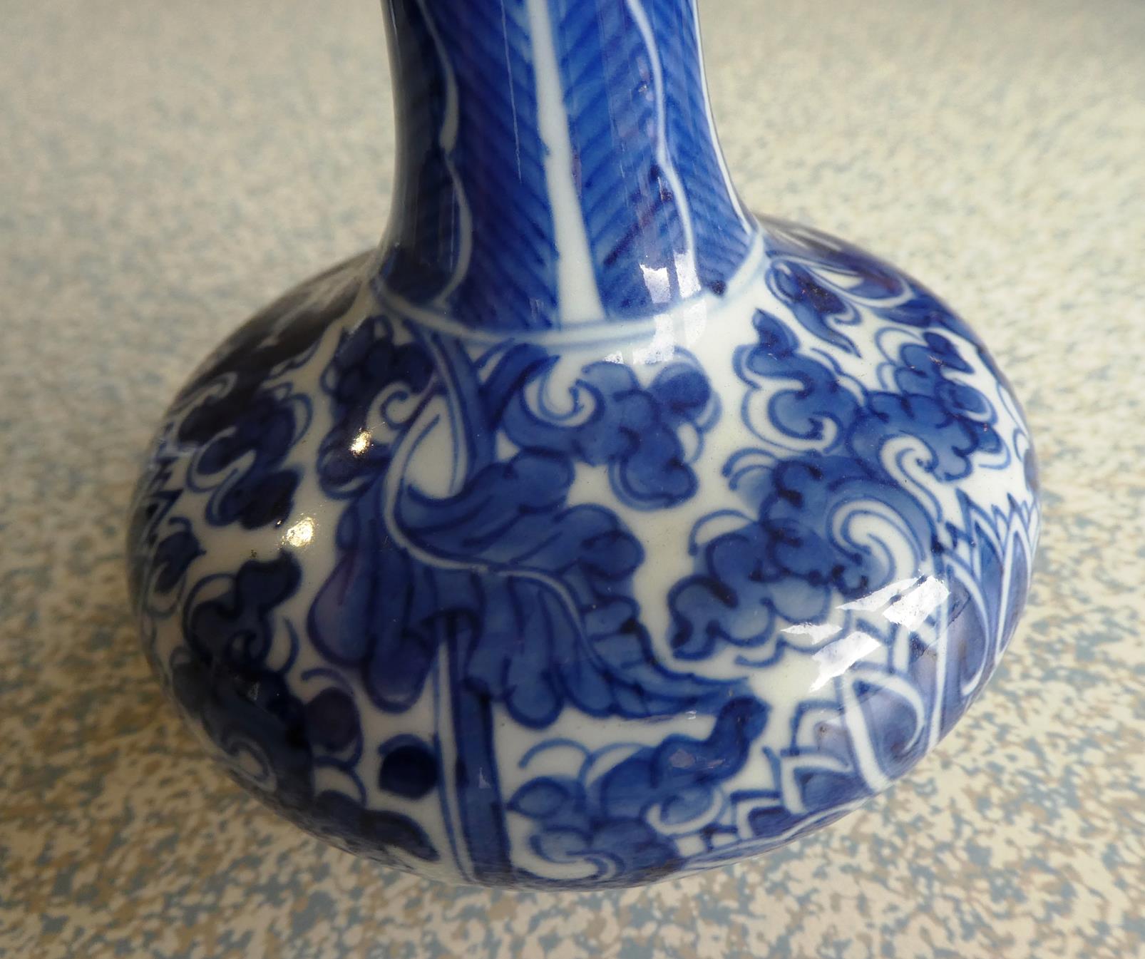 A Matched Garniture of Five Chinese Porcelain Bottle Vases, Kangxi, painted in underglaze blue - Image 30 of 48