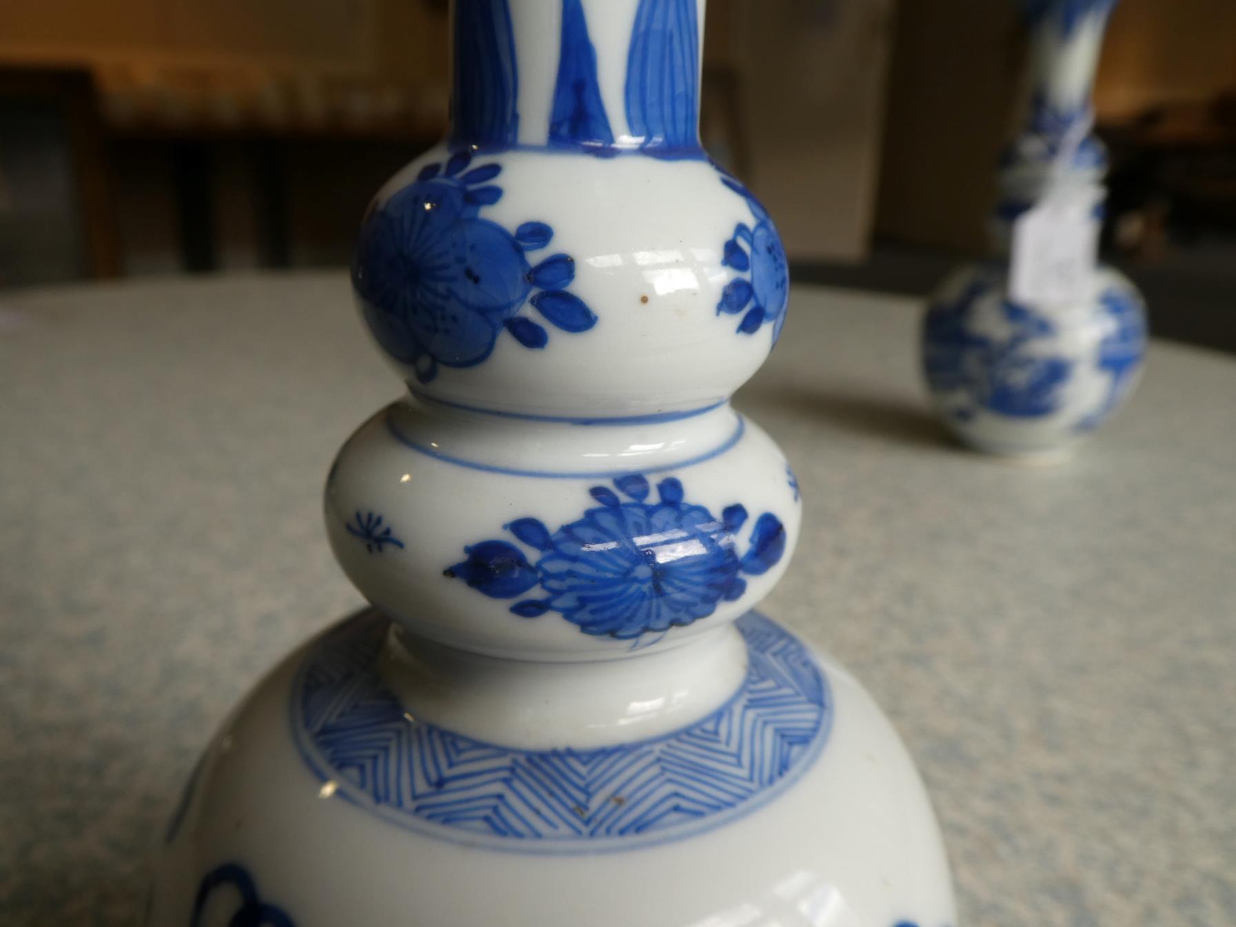 A Matched Pair of Chinese Porcelain Double Gourd Vases, Kangxi, with trumpet necks, painted in - Image 24 of 31