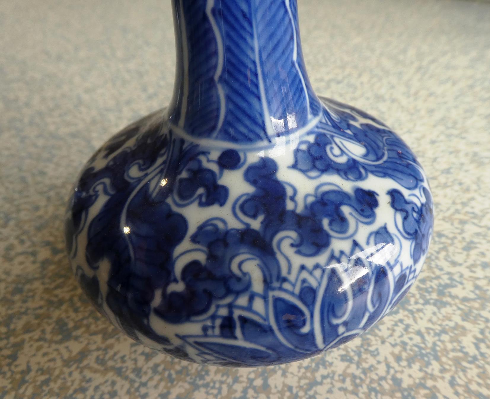 A Matched Garniture of Five Chinese Porcelain Bottle Vases, Kangxi, painted in underglaze blue - Image 29 of 48