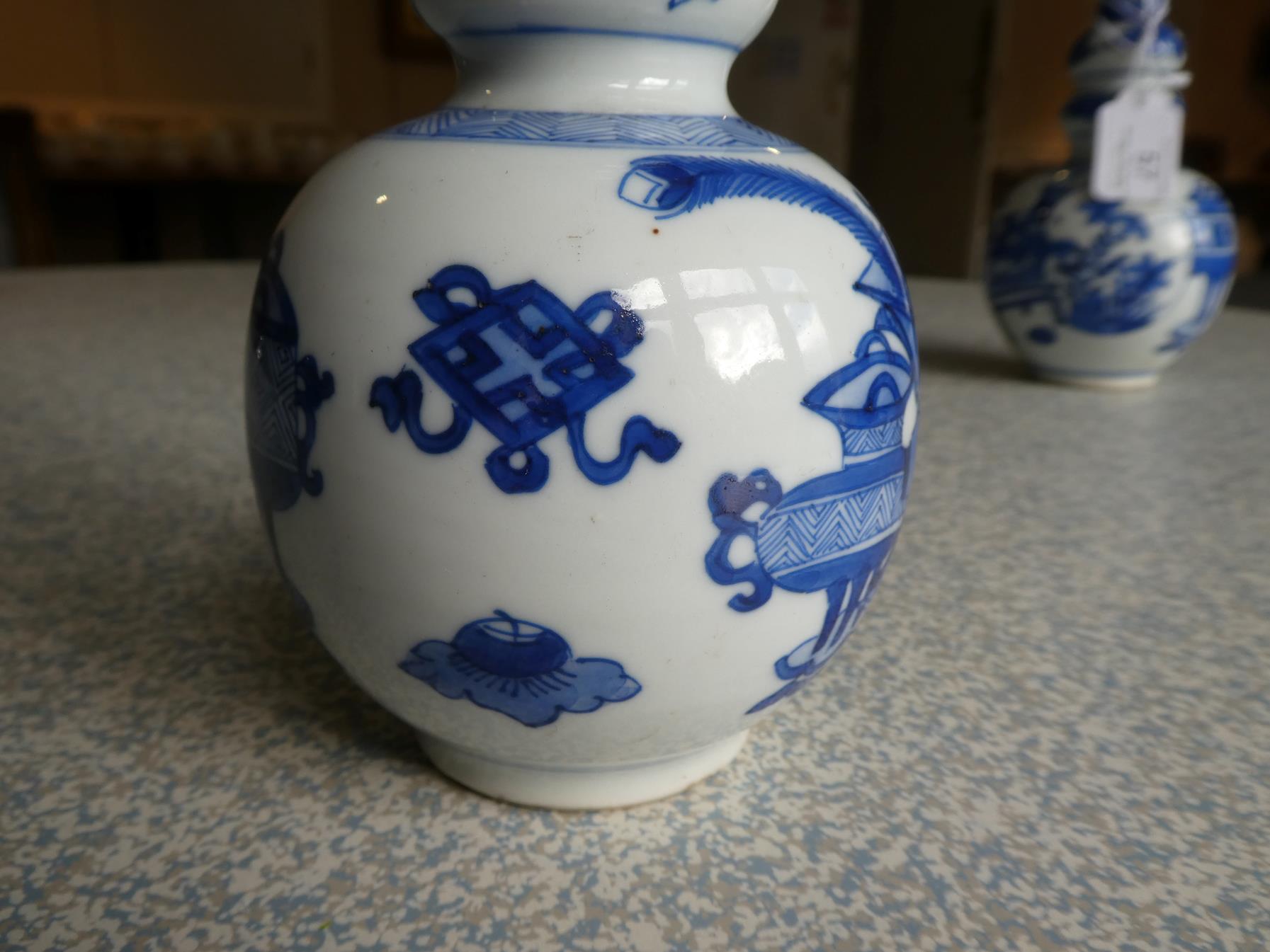 A Matched Pair of Chinese Porcelain Double Gourd Vases, Kangxi, with trumpet necks, painted in - Image 18 of 31