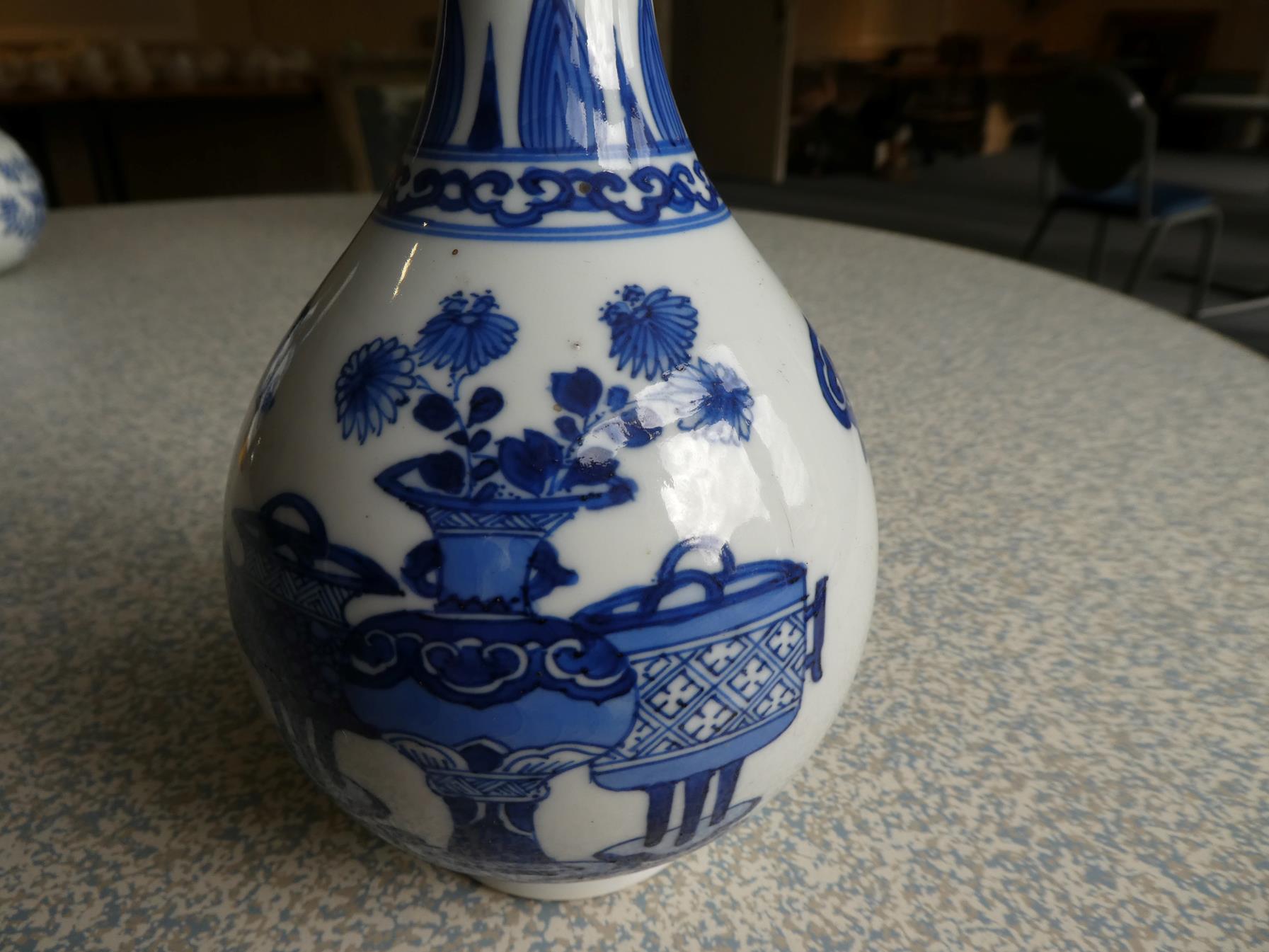 A Pair of Chinese Porcelain Bottle Vases, Kangxi, painted in underglaze blue with scrolls and - Image 20 of 33