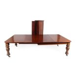 A Victorian Mahogany Extending Dining Table, circa 1870, with four additional leaves and storage