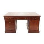 A George III Style Mahogany Partners' Desk, late 19th/early 20th century, the green leather