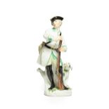 A Meissen Porcelain Figure of a Huntsman, circa 1750, standing wearing a tricorn hat and green and