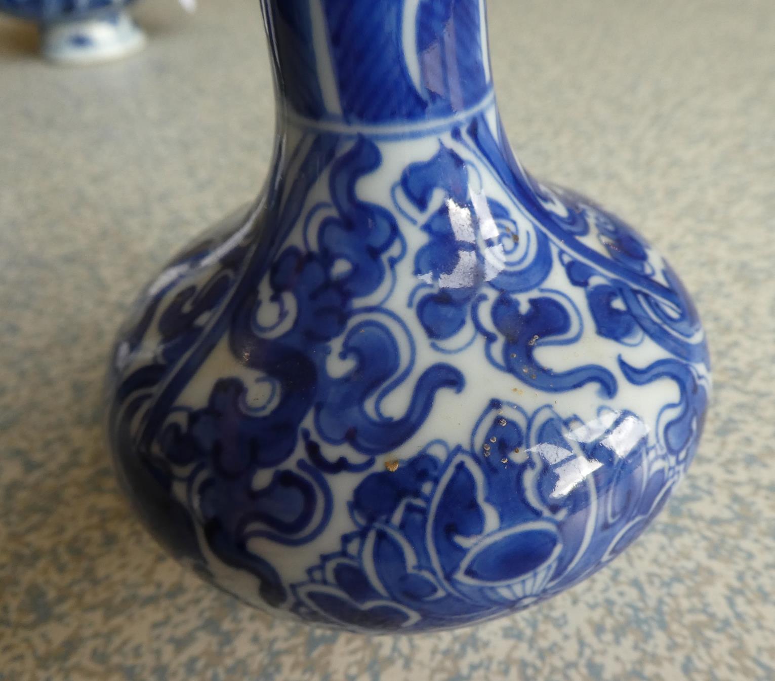 A Matched Garniture of Five Chinese Porcelain Bottle Vases, Kangxi, painted in underglaze blue - Image 7 of 48