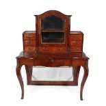 A Victorian Figured Walnut and Gilt Metal Mounted Bureau de Dame, in Louis XV style, the arched