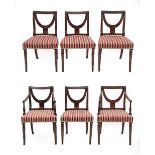 A Set of Six Regency Mahogany Dining Chairs, early 19th century, including two carvers, recovered in