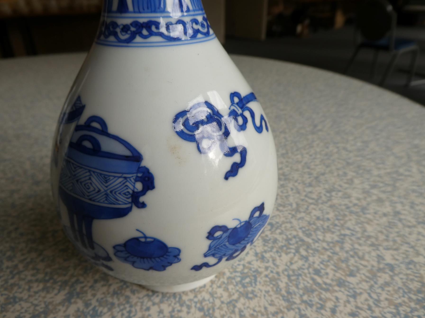 A Pair of Chinese Porcelain Bottle Vases, Kangxi, painted in underglaze blue with scrolls and - Image 6 of 33
