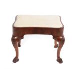 An Irish Carved Walnut Dressing Stool, in George I style, the drop-in seat within a plain seat rail,