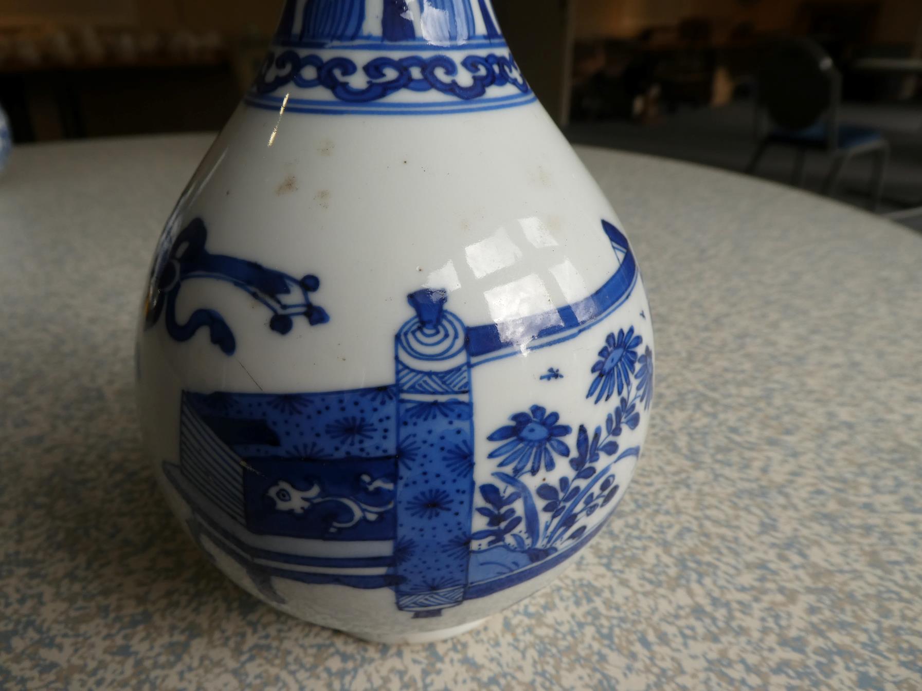 A Pair of Chinese Porcelain Bottle Vases, Kangxi, painted in underglaze blue with scrolls and - Image 18 of 33