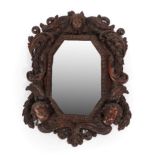 A 17th Century Italian Baroque Wall Mirror, the later plate within an acanthus carved and scrolled