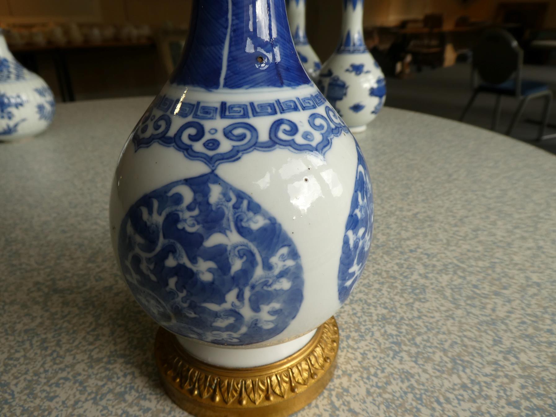 A Gilt Metal Mounted Chinese Porcelain Bottle Vase, the porcelain Kangxi, painted in underglaze blue - Image 4 of 15