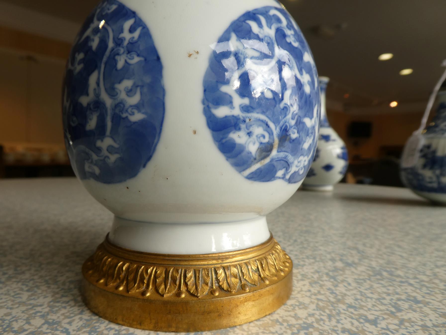 A Gilt Metal Mounted Chinese Porcelain Bottle Vase, the porcelain Kangxi, painted in underglaze blue - Image 15 of 15