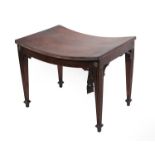 A George III Style Mahogany Stool, early 20th century, the solid dished seat with reeded edge