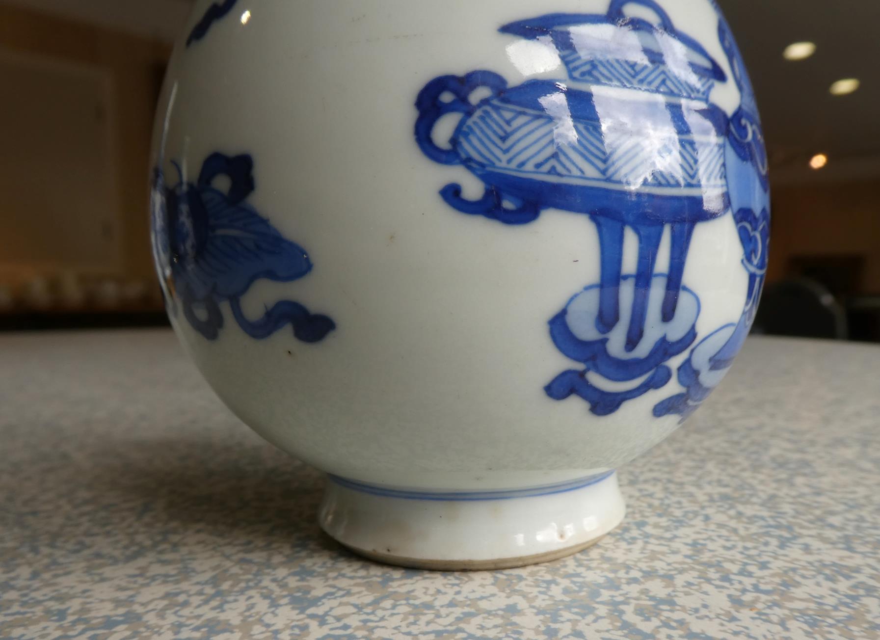 A Pair of Chinese Porcelain Bottle Vases, Kangxi, painted in underglaze blue with scrolls and - Image 14 of 33