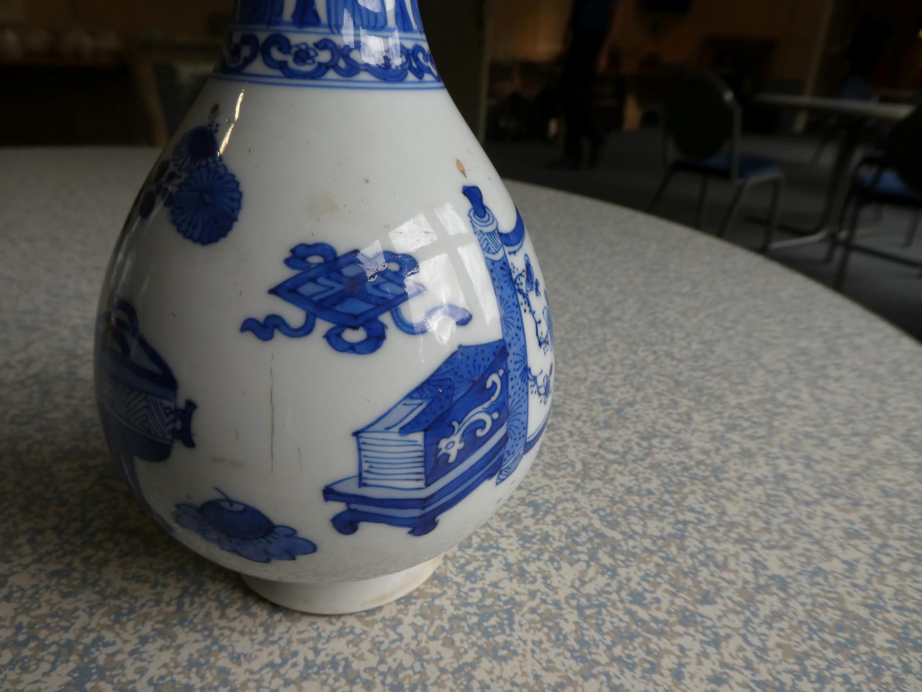 A Pair of Chinese Porcelain Bottle Vases, Kangxi, painted in underglaze blue with scrolls and - Image 4 of 33