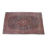 Fine Large Kashan Carpet Central Iran, circa 1930 The deep indigo field of scrolling vines and