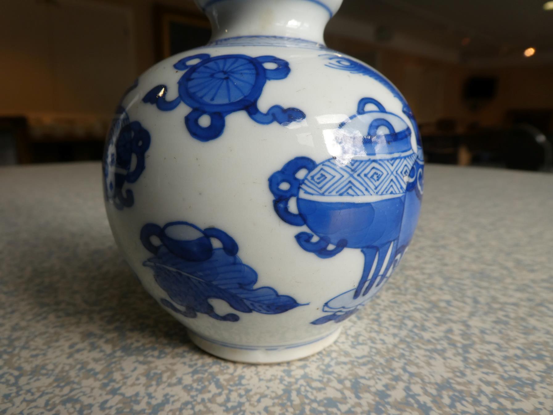 A Matched Pair of Chinese Porcelain Double Gourd Vases, Kangxi, with trumpet necks, painted in - Image 7 of 31