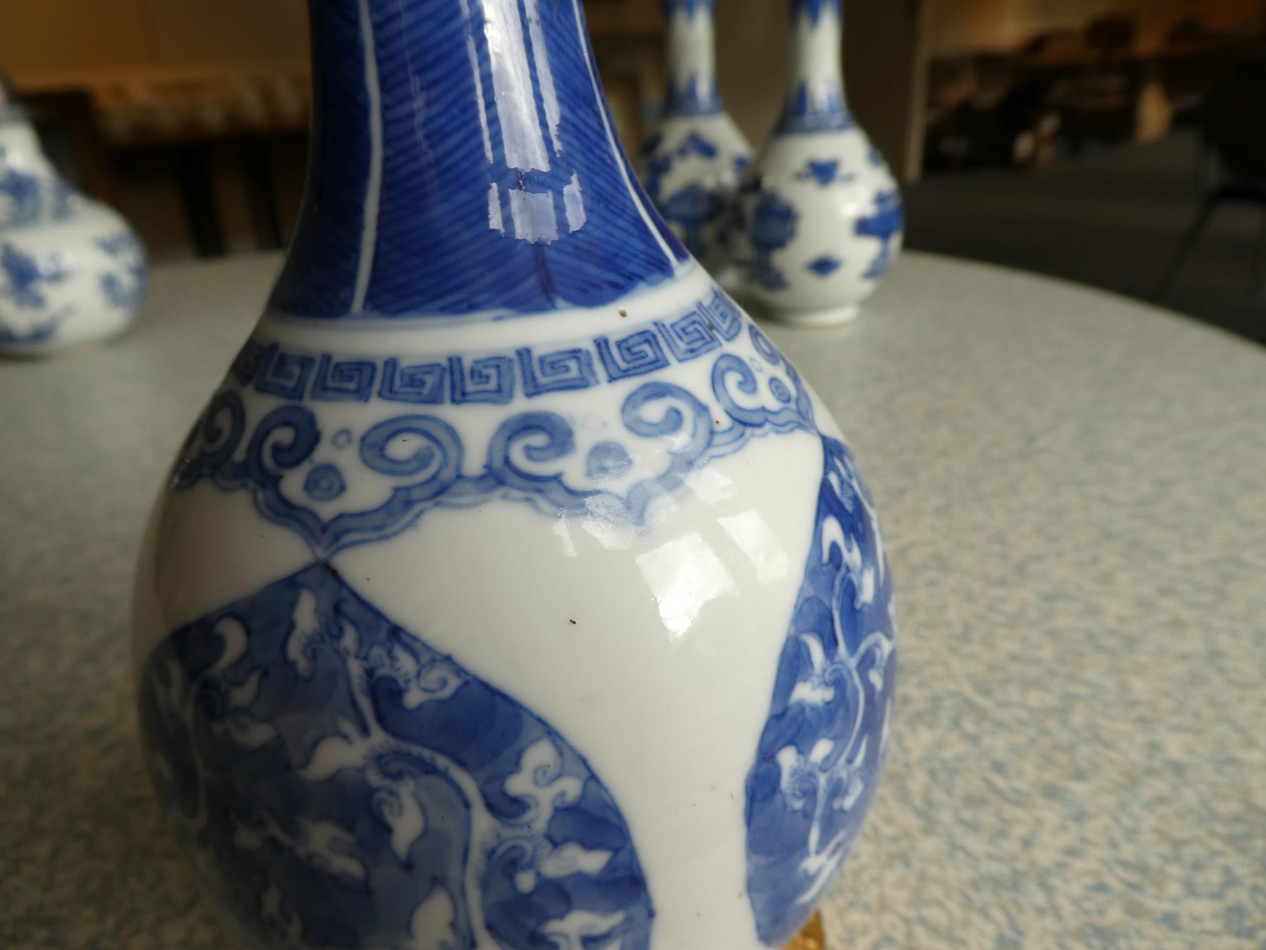 A Gilt Metal Mounted Chinese Porcelain Bottle Vase, the porcelain Kangxi, painted in underglaze blue - Image 7 of 15