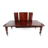 A Victorian Mahogany Telescopic-Action Extending Dining Table, circa 1870, with four original
