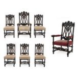 A Set of Eight Victorian Carved Oak Dining Chairs, circa 1870, including two carvers, seven