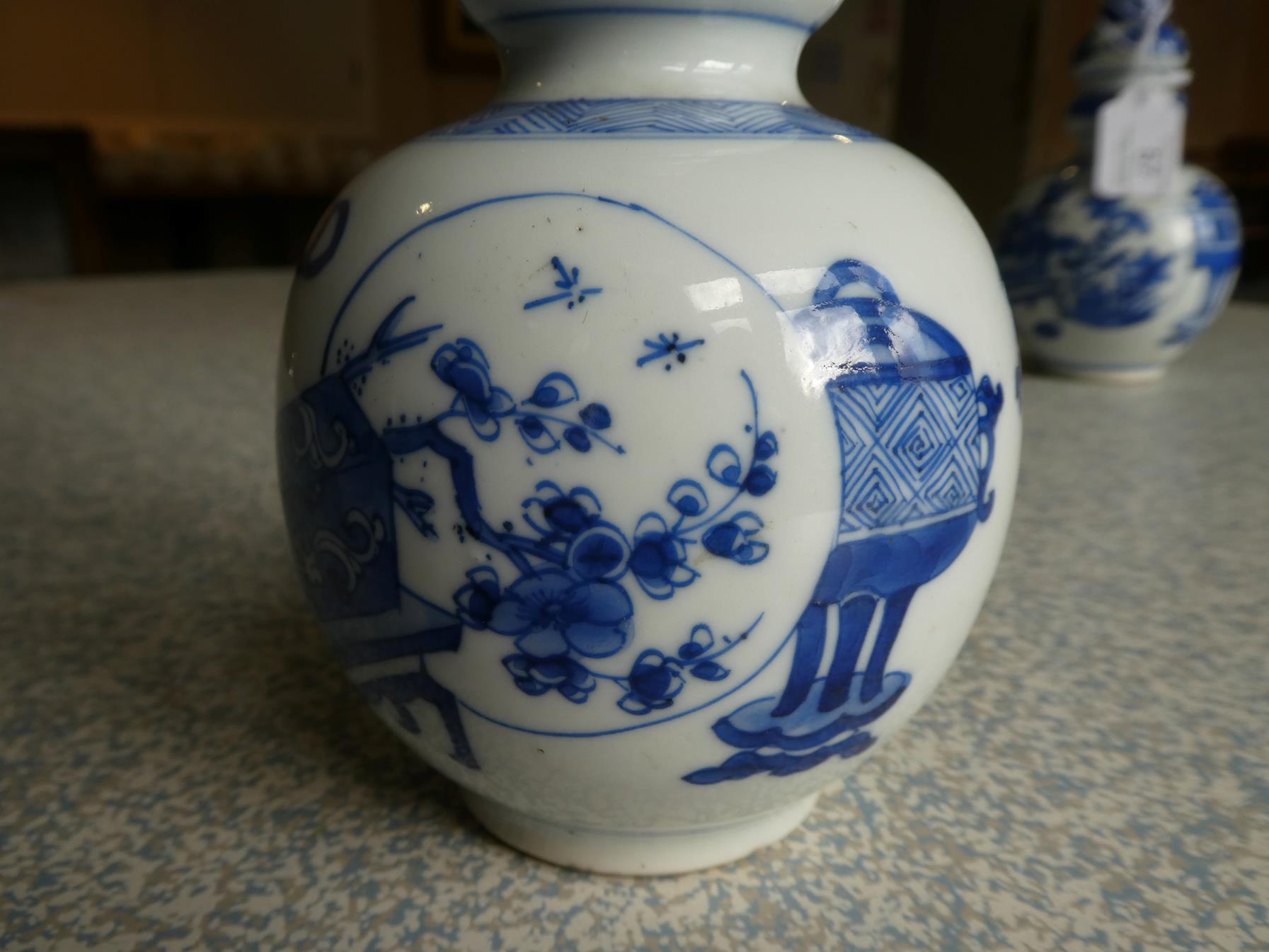 A Matched Pair of Chinese Porcelain Double Gourd Vases, Kangxi, with trumpet necks, painted in - Image 19 of 31