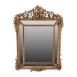 A French Gilt and Gesso Marginal Wall Mirror, 3rd quarter 19th century, the bevelled glass mirror