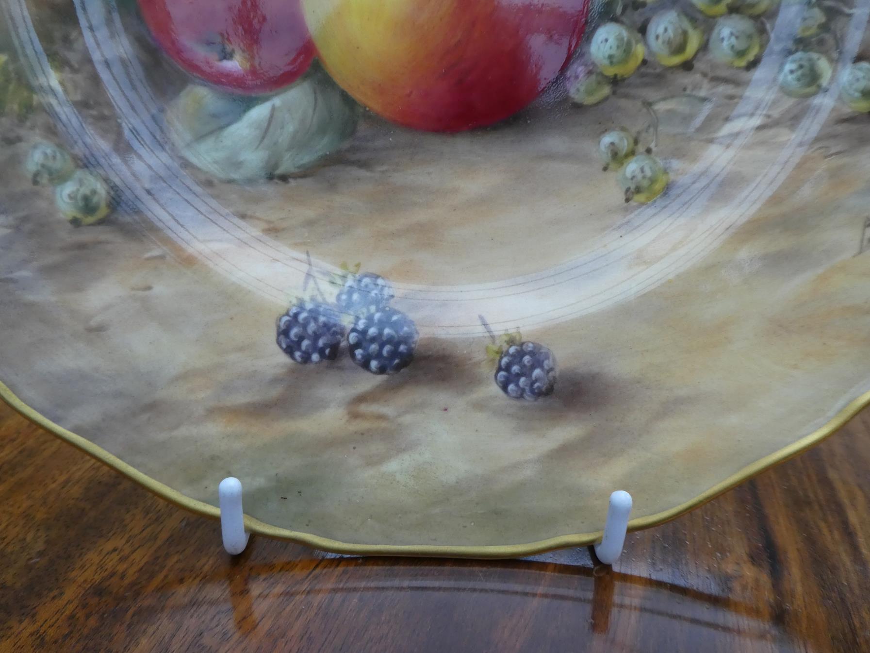 A Pair of Royal Worcester Porcelain Large Plates, by Peter Love, 2nd half 20th century, painted with - Image 20 of 21