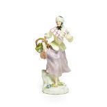 A Meissen Porcelain Figure of a Street Vendor, circa 1750, modelled as a girl wearing a black and