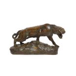 Thomas François Cartier (1879-1943): A Bronze Figure of a Crouching Tiger, on a mound base, signed T